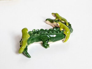 cute porcelain crocodile mama figurine and babies