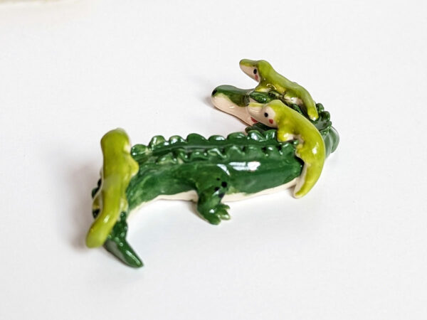 cute porcelain crocodile mama figurine and babies