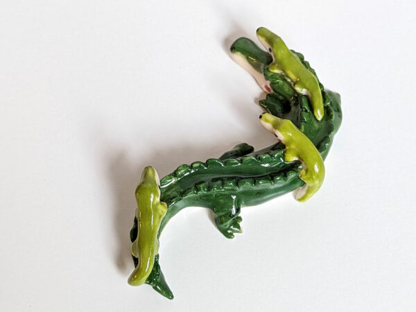 cute porcelain crocodile mama figurine and babies