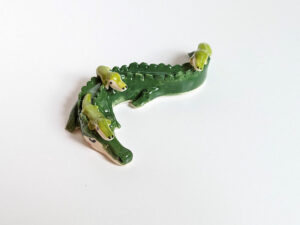 cute porcelain crocodile mama figurine and babies
