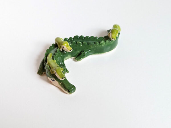 cute porcelain crocodile mama figurine and babies