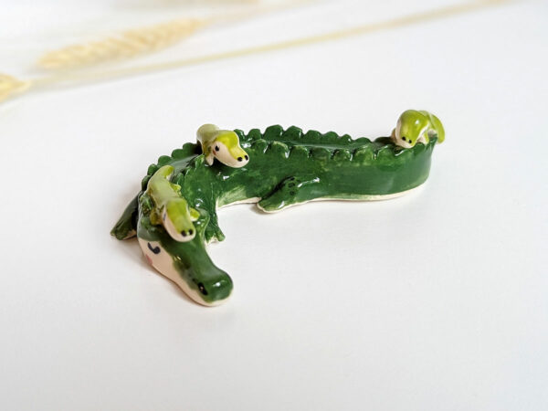 cute porcelain crocodile mama figurine and babies