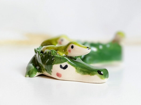 cute porcelain crocodile mama figurine and babies