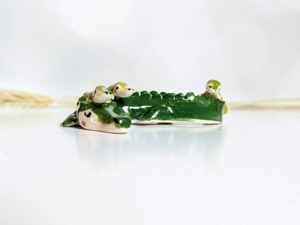 cute porcelain crocodile mama figurine and babies