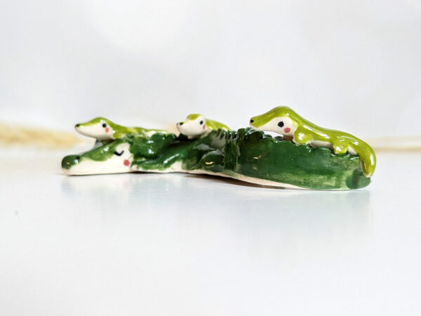 cute porcelain crocodile mama figurine and babies