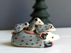 cute opossum family porcelain sculpture