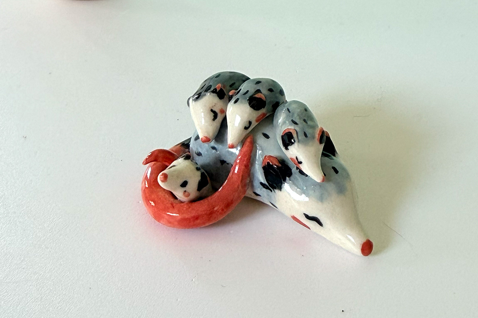 Porcelain Figurine - Sleeping Opossum Family