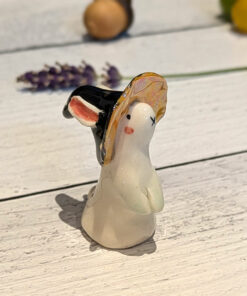 adorable porcelain figurine of a witch bunny
