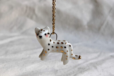 Porcelain and Gold spotted cat pendant