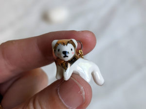 porcelain gold lion pendant