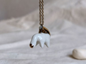 porcelain gold lion pendant