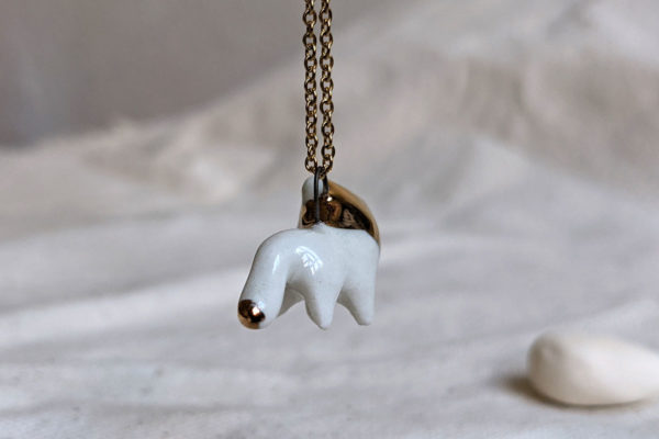 porcelain gold lion pendant