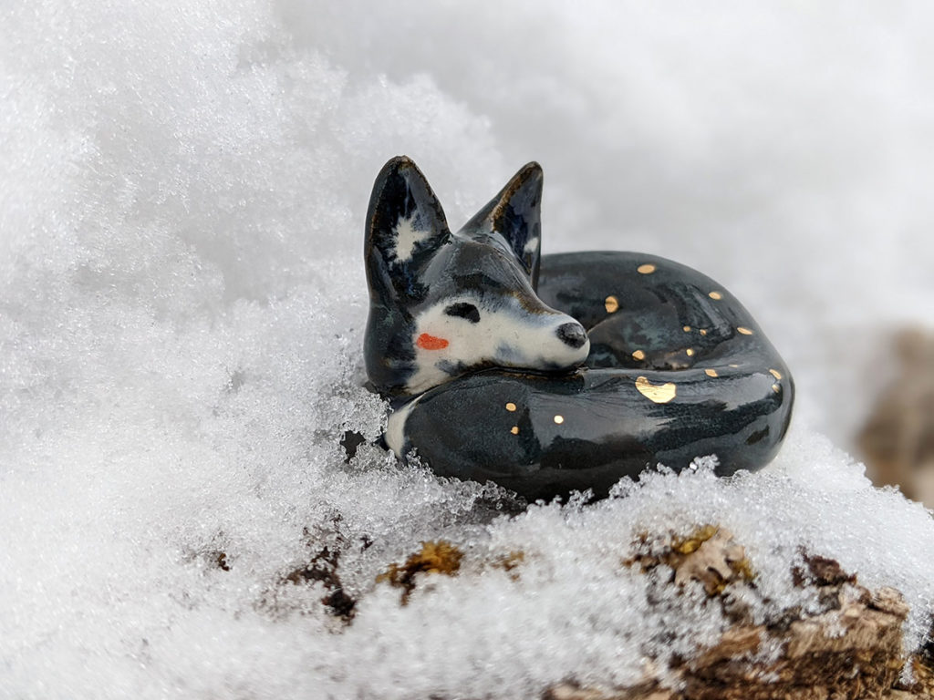 sleepy fox figurine night