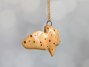 cute handmade porcelain barn owl pendant with wings out and gold