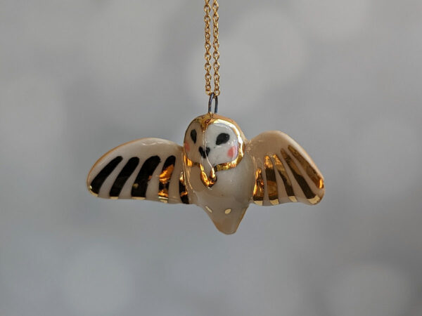 cute handmade porcelain barn owl pendant with wings out and gold