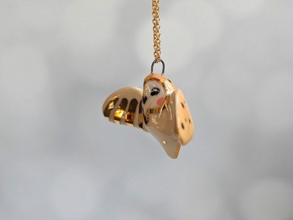 cute handmade porcelain barn owl pendant with wings out and gold