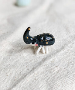 porcelain beetle figurine