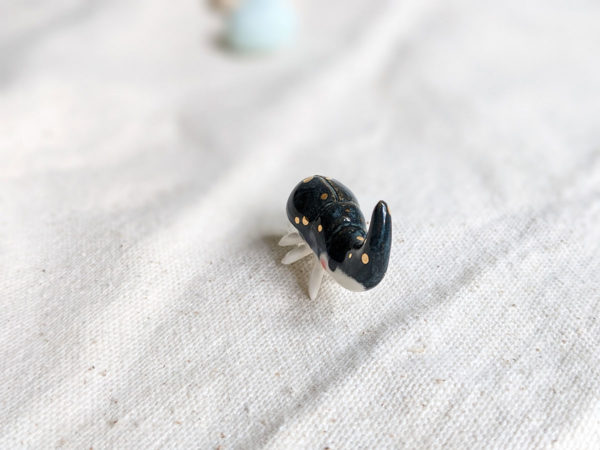 porcelain beetle figurine