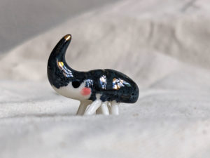 porcelain beetle figurine