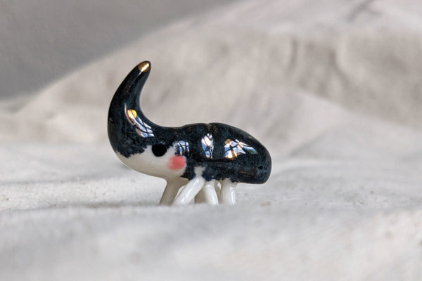 porcelain beetle figurine