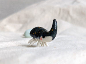 porcelain beetle figurine