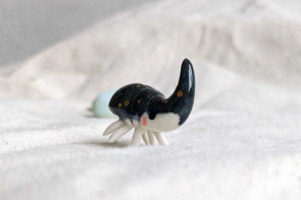 porcelain beetle figurine