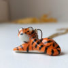 porcelain pendant lying tiger