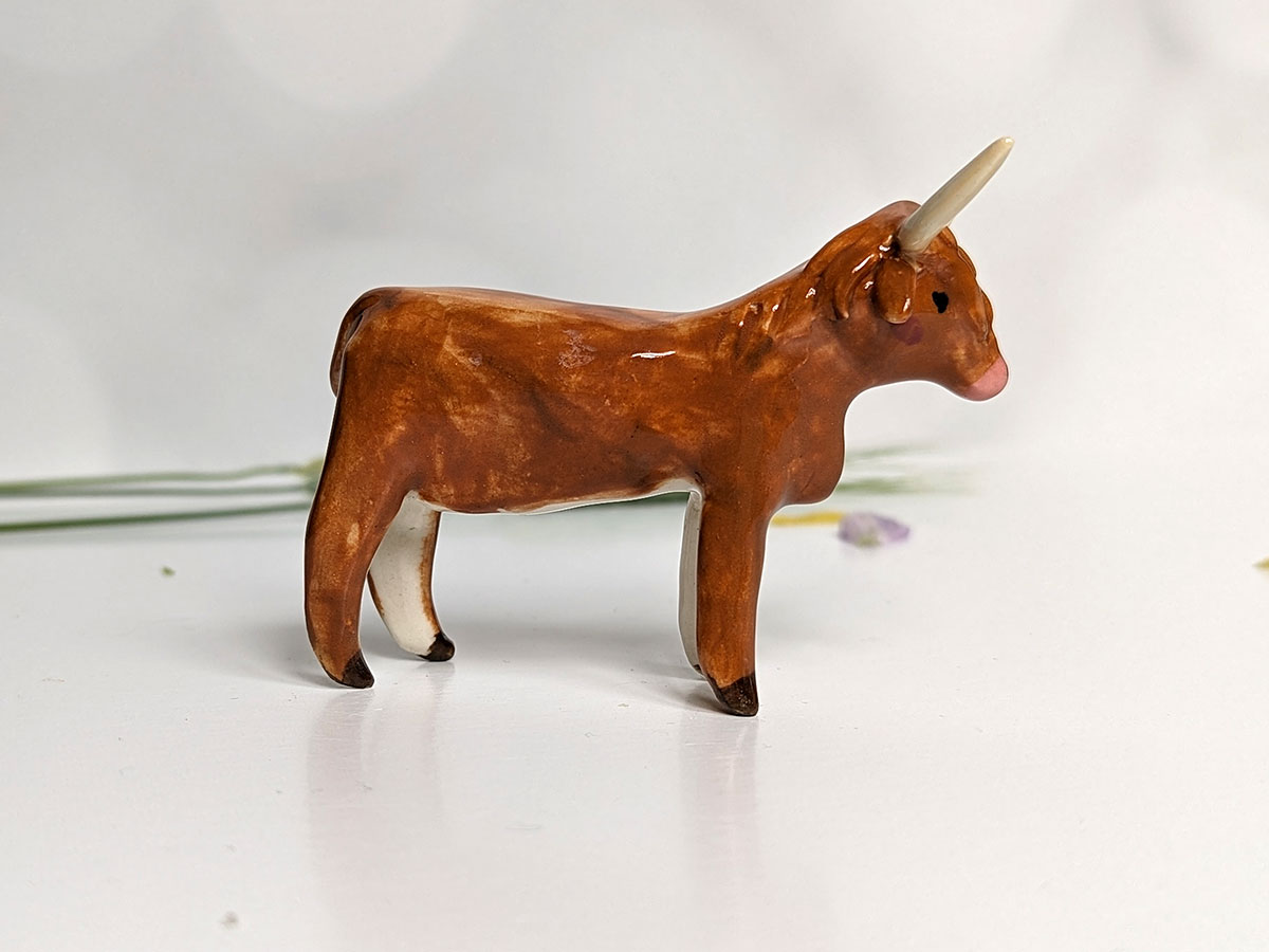 porcelan highland cow figurine