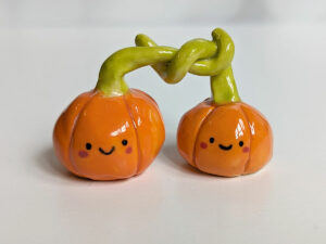 pumpkin couple porcelain figurine