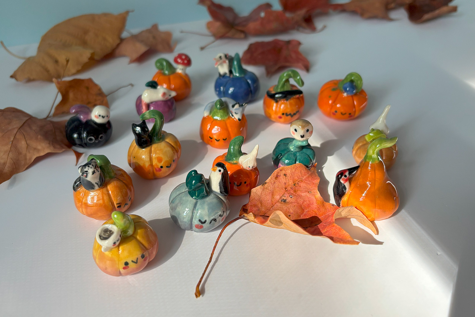 Alternative view of Porcelain Pumpkins + Friend