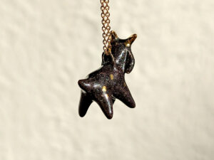 Black Phillip porcelain pendant with gold