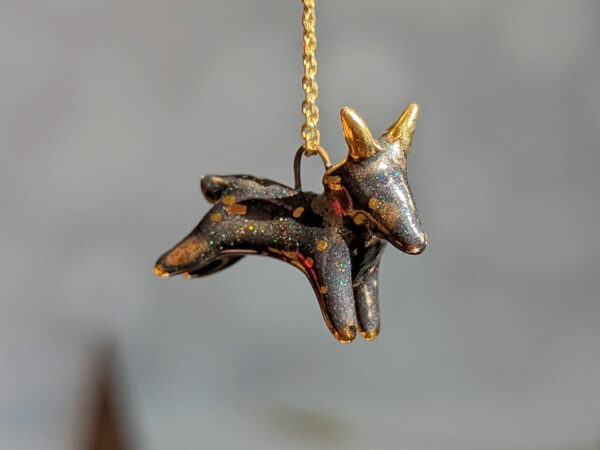 Black Phillip porcelain pendant with gold
