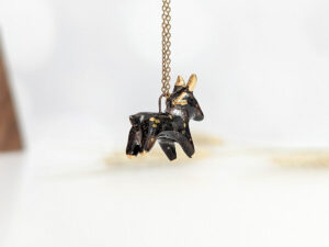 Black Phillip porcelain pendant with gold
