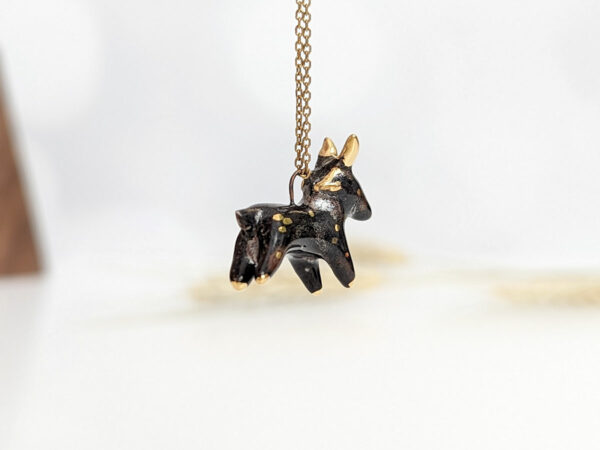 Black Phillip porcelain pendant with gold