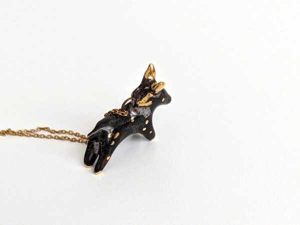 Black Phillip porcelain pendant with gold