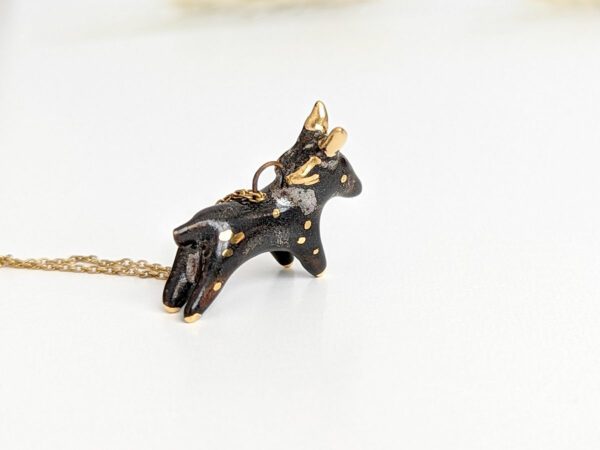 Black Phillip porcelain pendant with gold