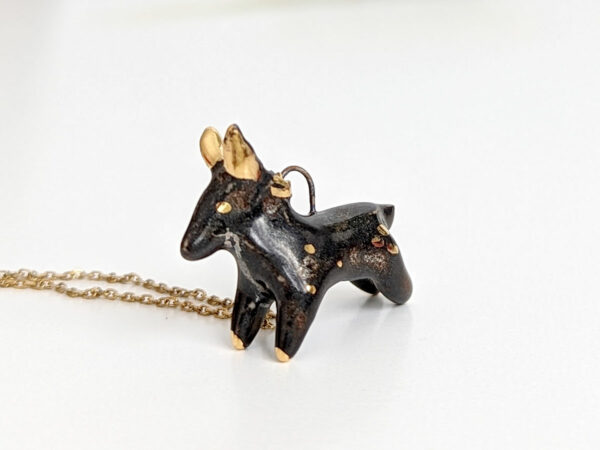 Black Phillip porcelain pendant with gold