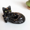 black cat void kitty porcelain figurine