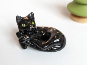 black cat void kitty porcelain figurine