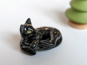 black cat void kitty porcelain figurine