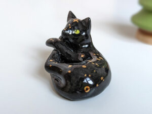 black cat void kitty porcelain figurine