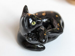 black cat void kitty porcelain figurine