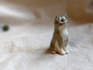 porcelain cat figurine grey tabby longhair