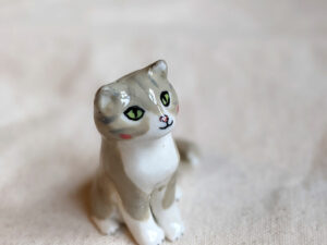 porcelain cat figurine grey tabby longhair