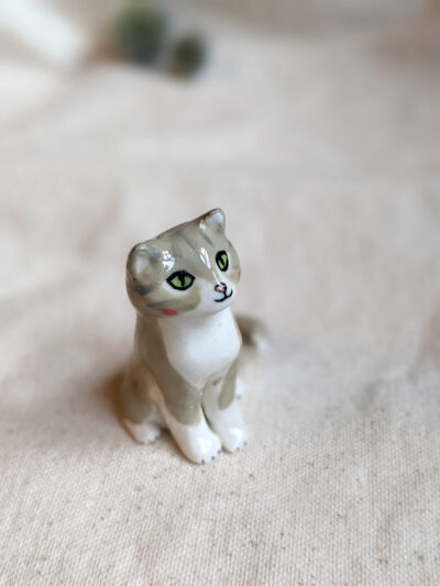 porcelain cat figurine grey tabby longhair