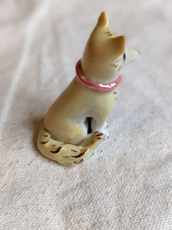 Porcelain dog figurine