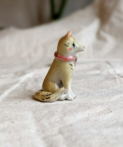Porcelain dog figurine