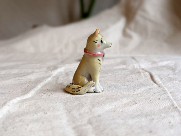 Porcelain dog figurine