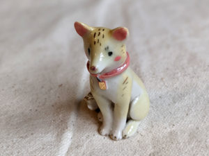 Porcelain dog figurine