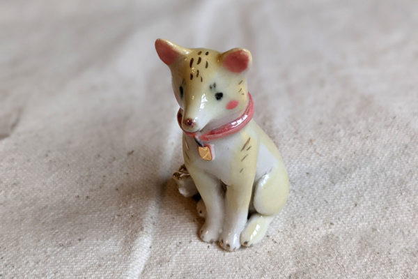 Porcelain dog figurine